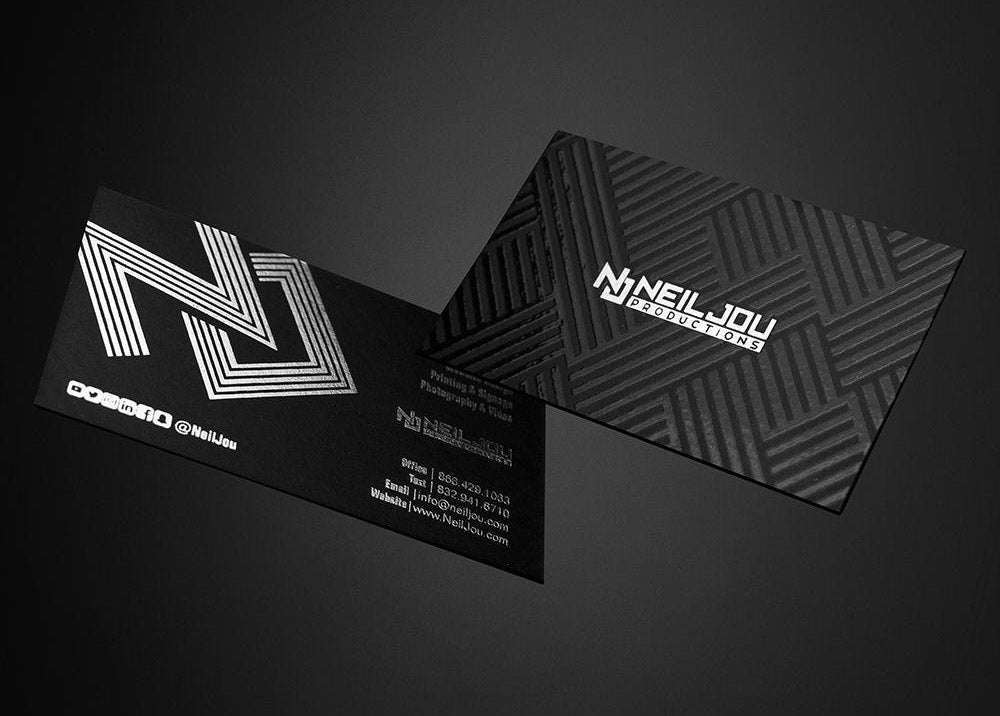 How does a business card help in improving a business